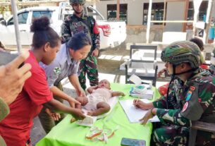 Satgas Yonif 642/Kps Laksanakan Yankes Dan Bagikan Bubur Kacang Hijau Untuk Anak-Anak