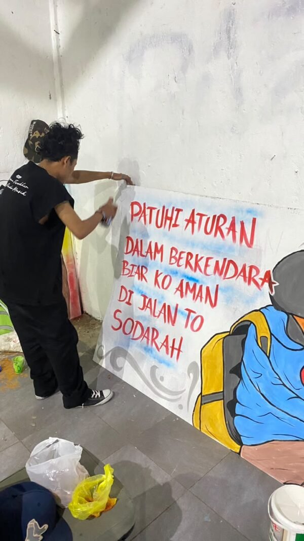 Semarak HUT Lalu Lintas ke-71, Ditlantas Polda PBD Ajak Generasi Muda Berkreativitas Lewat Mural